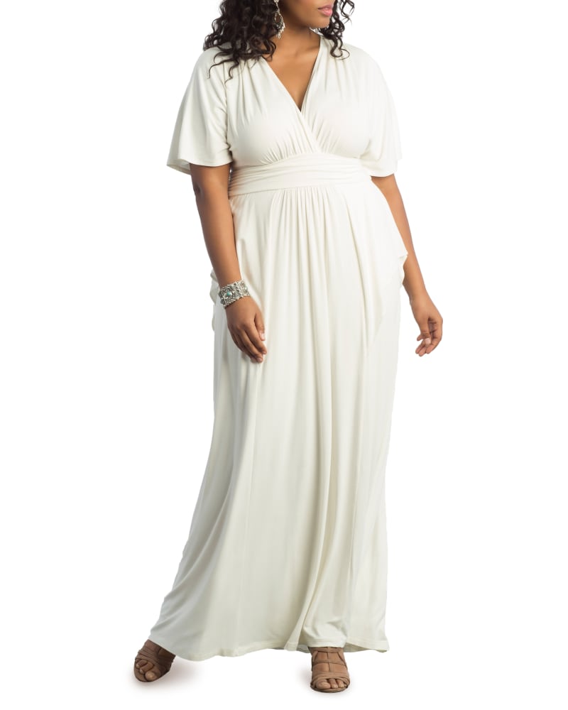 Front of a model wearing a size 0X Indie Twist Maxi Dress in IVORY by Kiyonna. | dia_product_style_image_id:272193